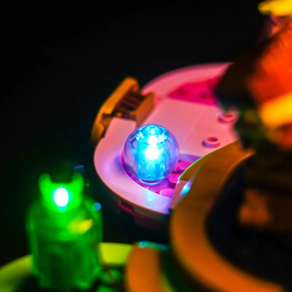 BrickBling lighting the Emerald City backdrop in LEGO 75682