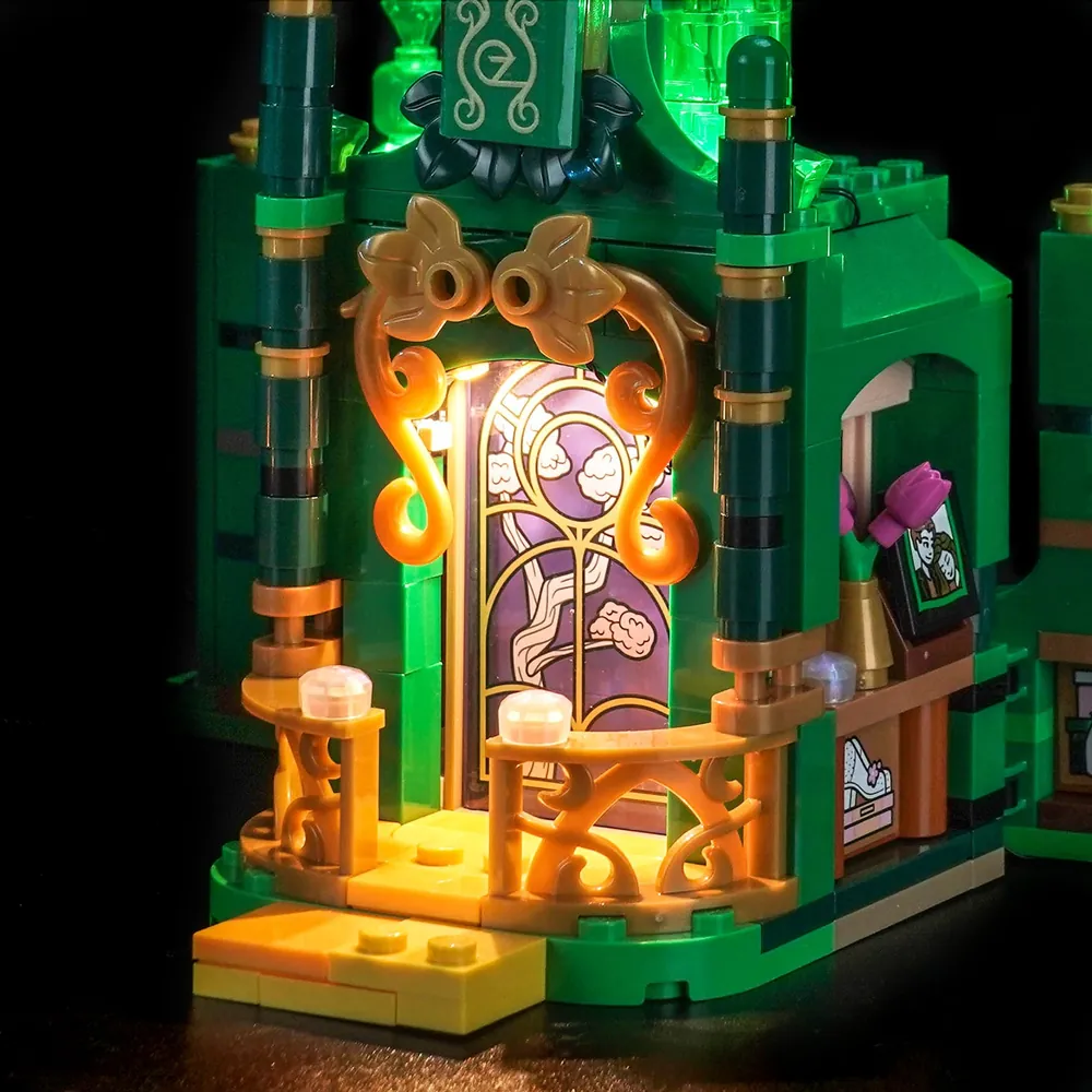 Side view of BrickBling lighting on Kiamo Ko Castle, showing the contrast between lit towers and dark interior