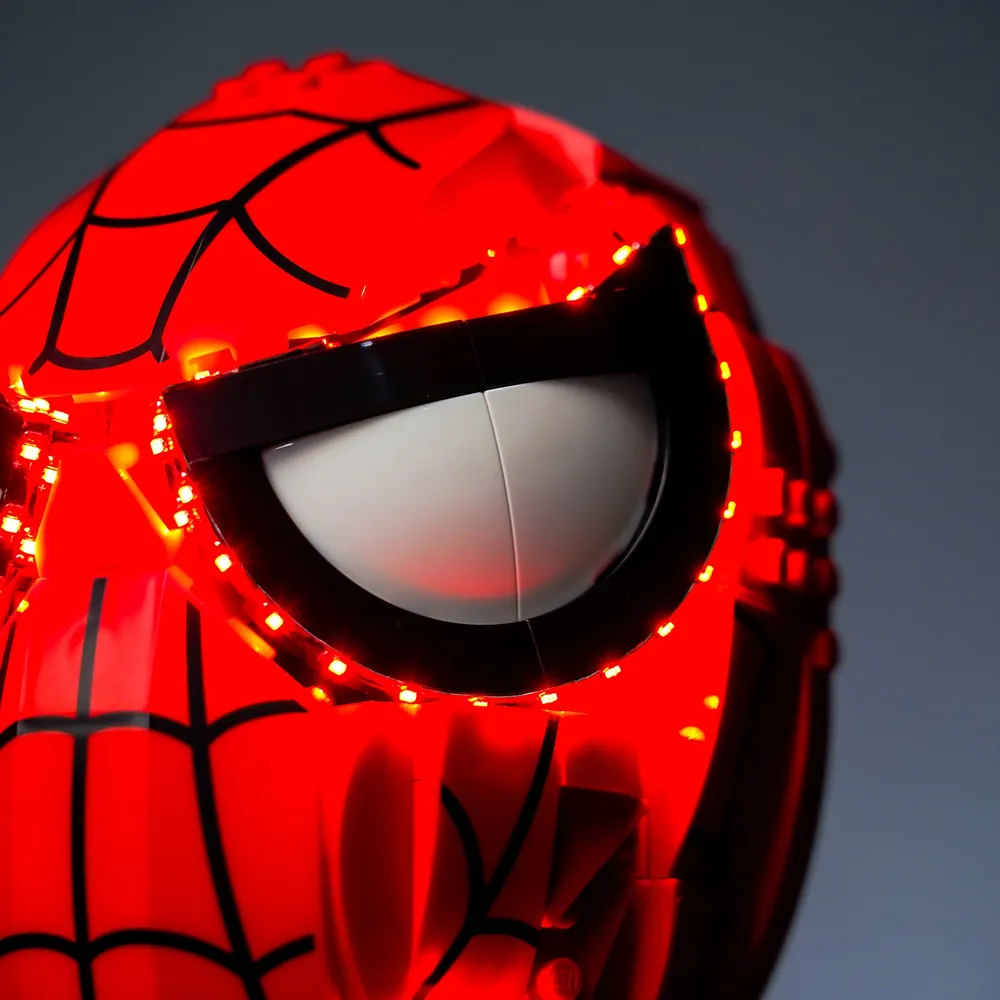 Close-up of BrickBling modular micro-LED wiring on the LEGO Spider-Man mask set