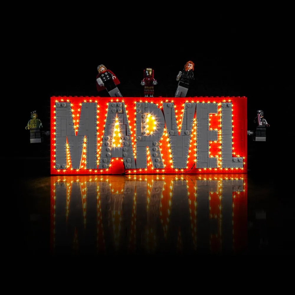 BrickBling LED kit lighting the LEGO MARVEL Logo and minifigures in a dark room