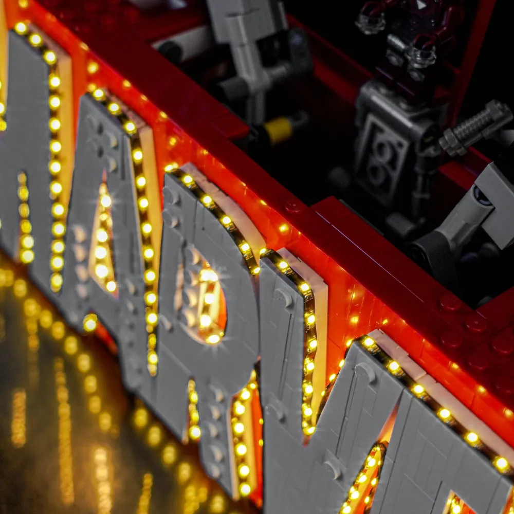 Close-up of BrickBling micro-LEDs behind the white MARVEL letters