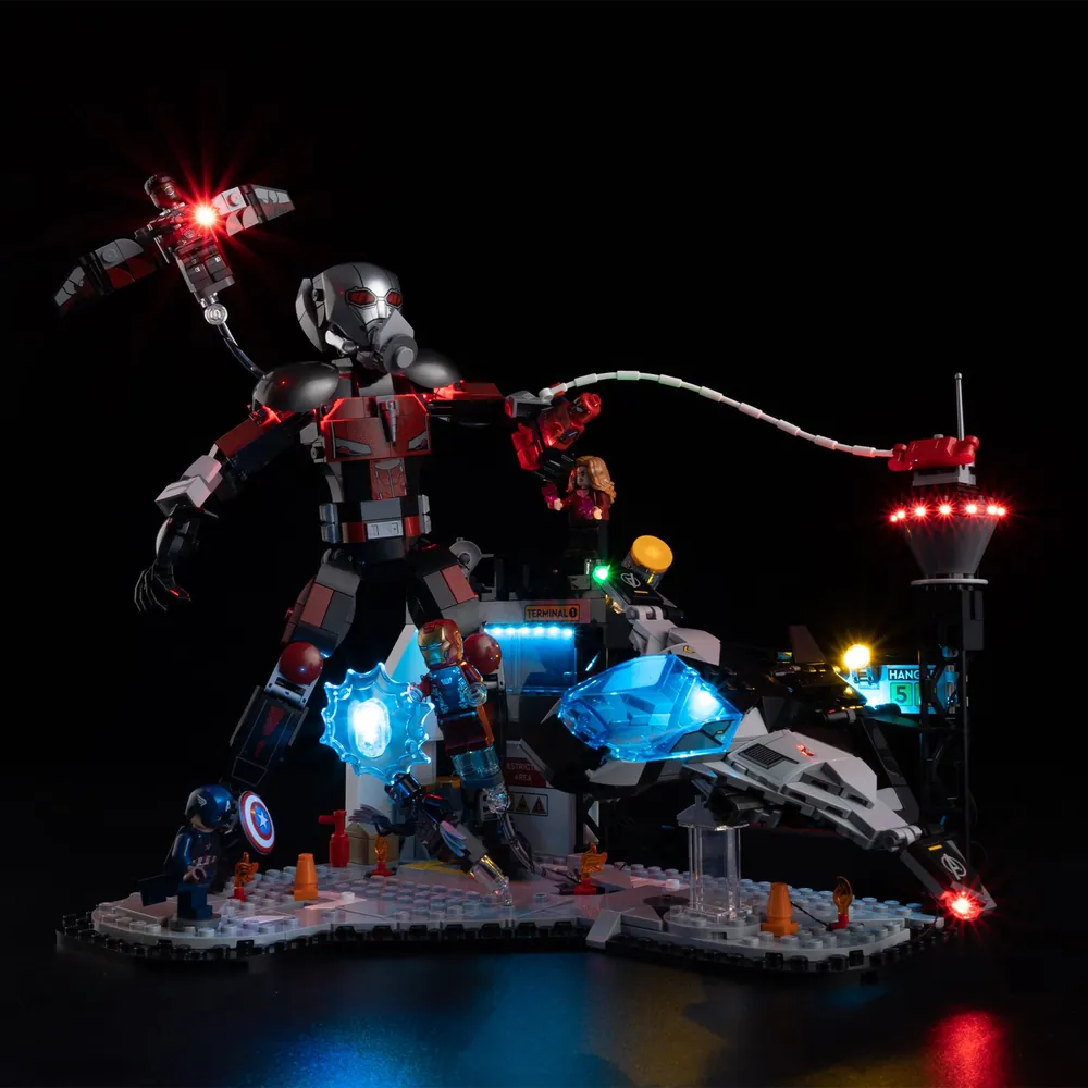 Game of Bricks LED kit for LEGO 76314 showing modular connectors and lit airport terminal