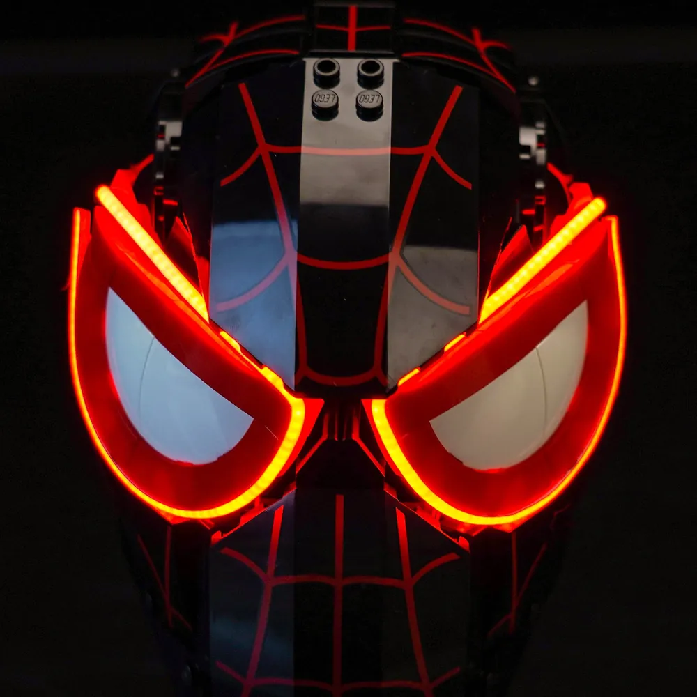 Close-up of BrickBling micro-LEDs highlighting red webbing on LEGO Miles Morales' Mask
