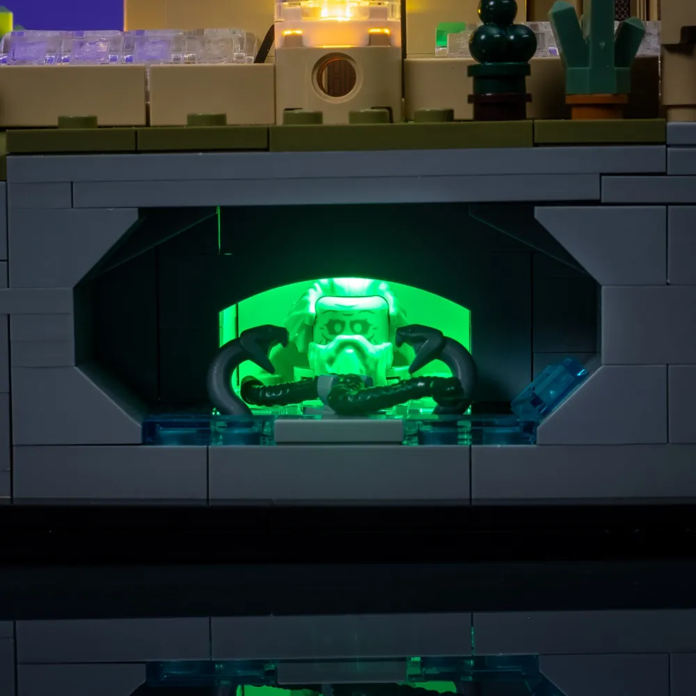 Wide shot of premium light kit on LEGO Hogwarts Castle and Grounds 76419 casting warm light on the castle