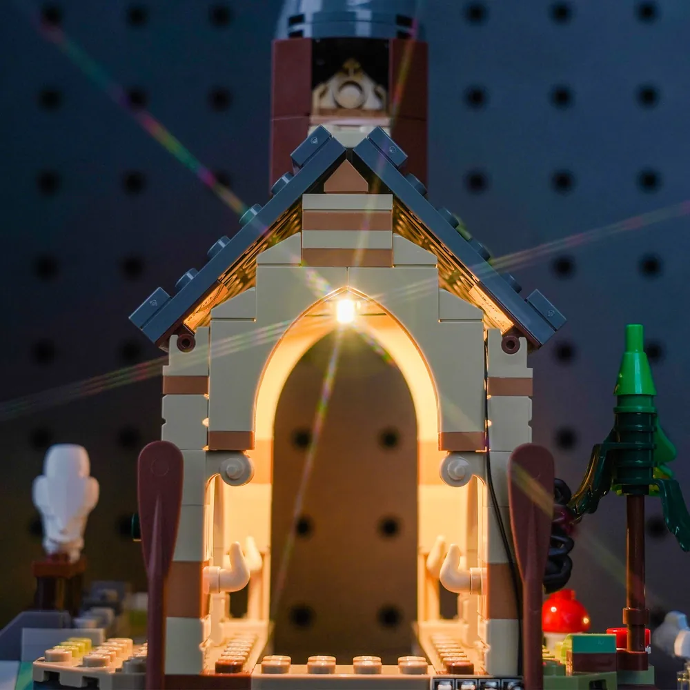 LEGO Hogwarts Boathouse with BrickBling lighting display under warm glow