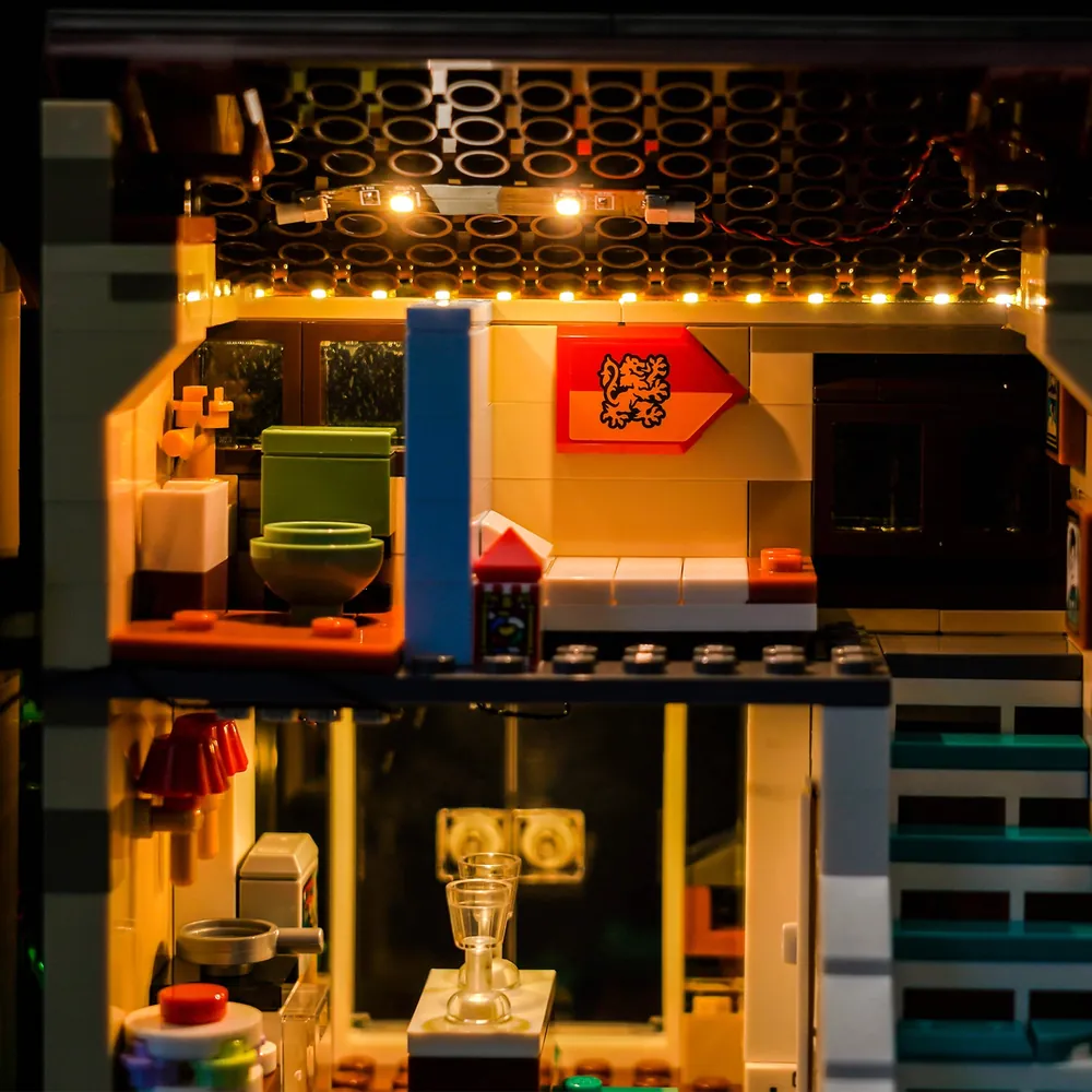 Close-up of BrickBling LED lights highlighting the exterior of Privet Drive and the inflated Aunt Marge mechanism