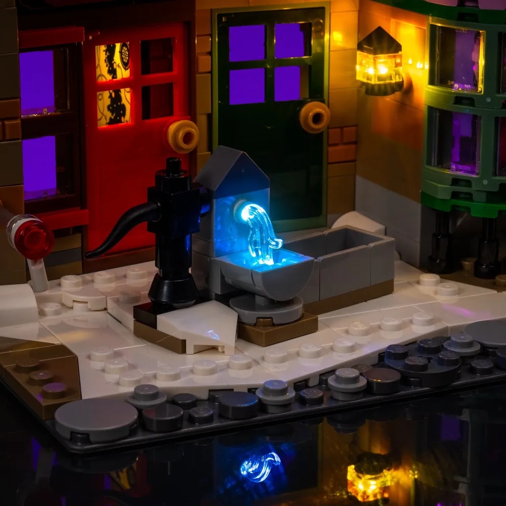 Warm lighting effects on Hogsmeade Village from Light My Bricks kit