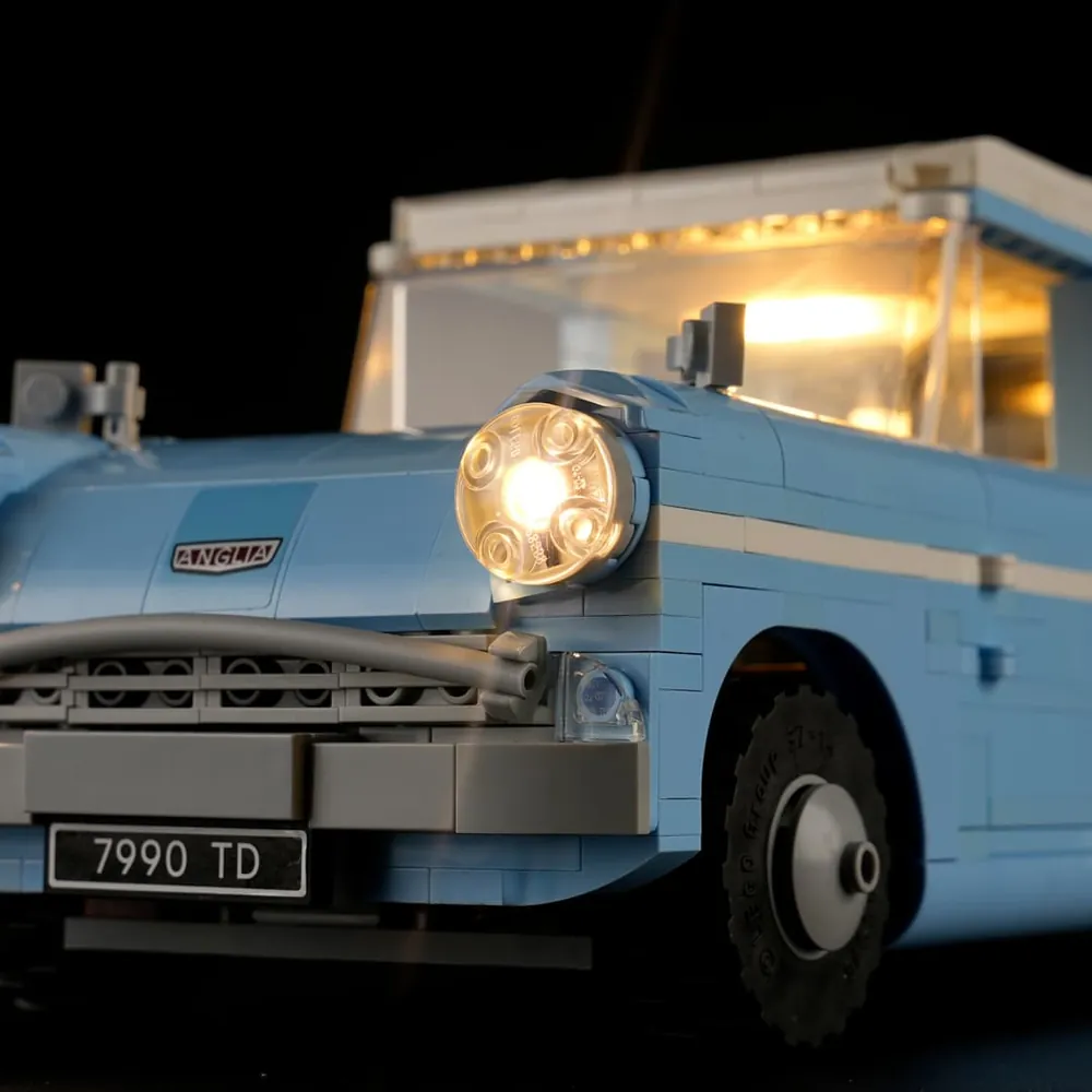 LED lights illuminating headlights and taillights on LEGO Ford Anglia 76470