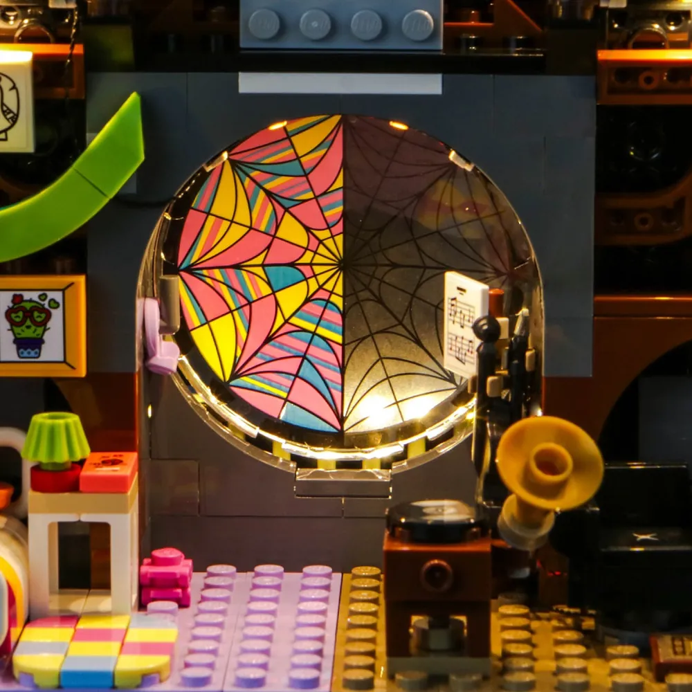 Close-up of BrickBling modular micro-LEDs hidden within LEGO dorm room set 76781