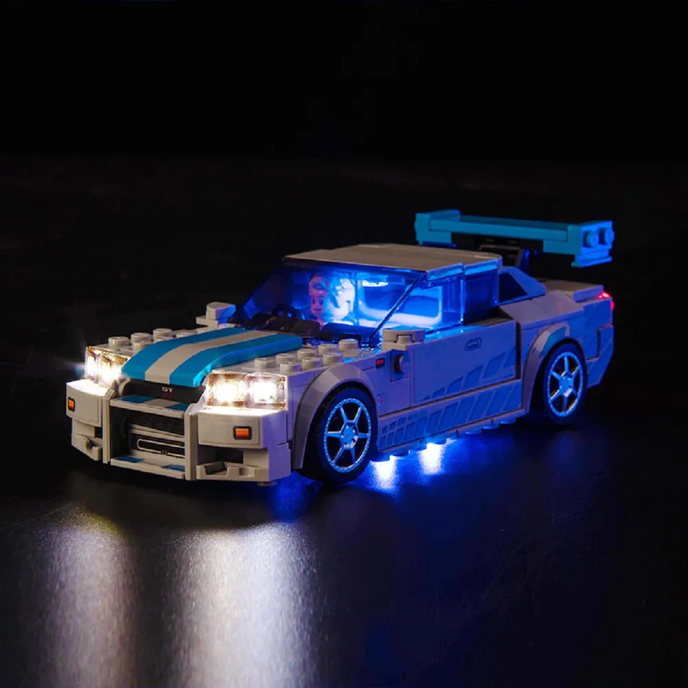 BrickBling LED kit lighting up the headlights and taillights of the LEGO Speed Champions Nissan Skyline GT-R R34