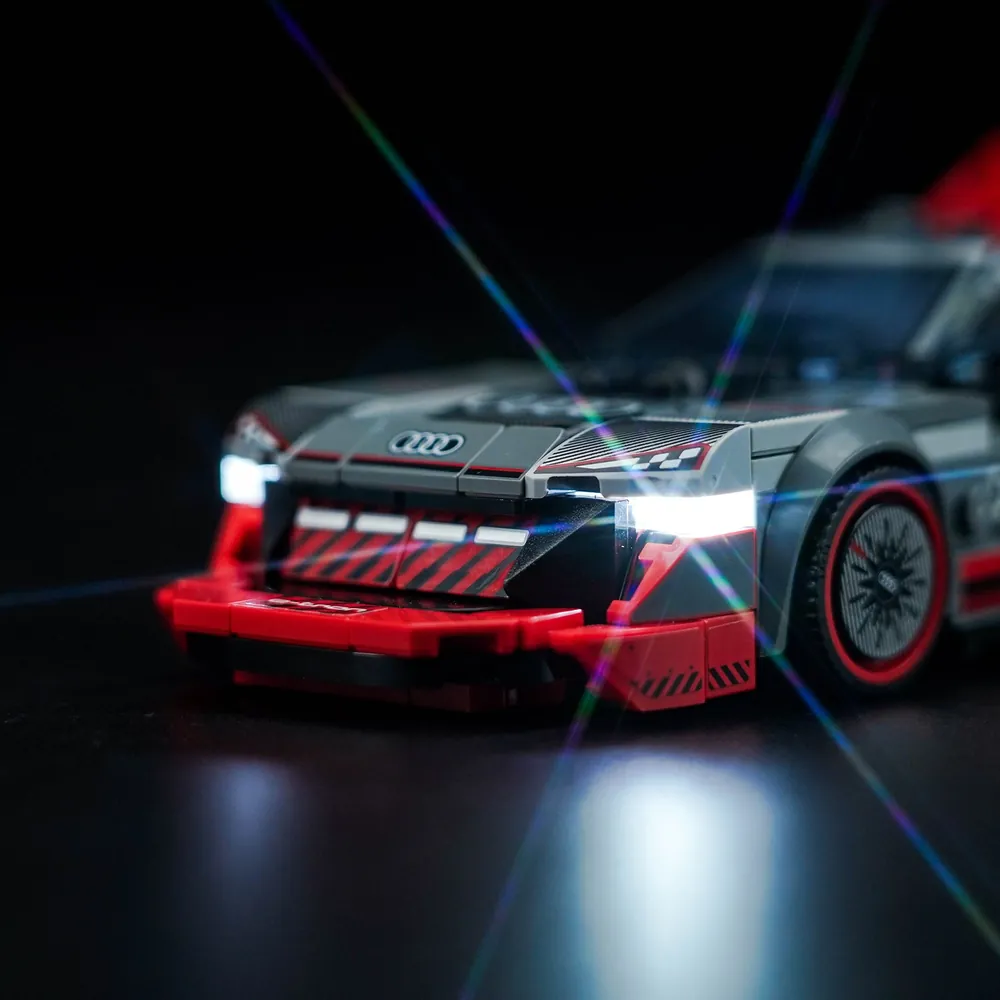 Close-up of BrickBling micro-LEDs on the Audi e-tron LEGO set showing cockpit glow
