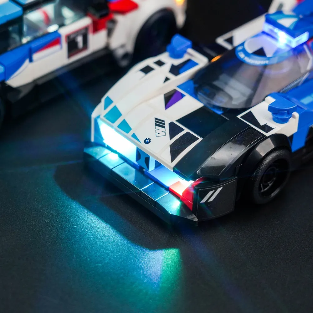 Close-up of modular micro-LEDs on LEGO 76922 showing wire routing between bricks