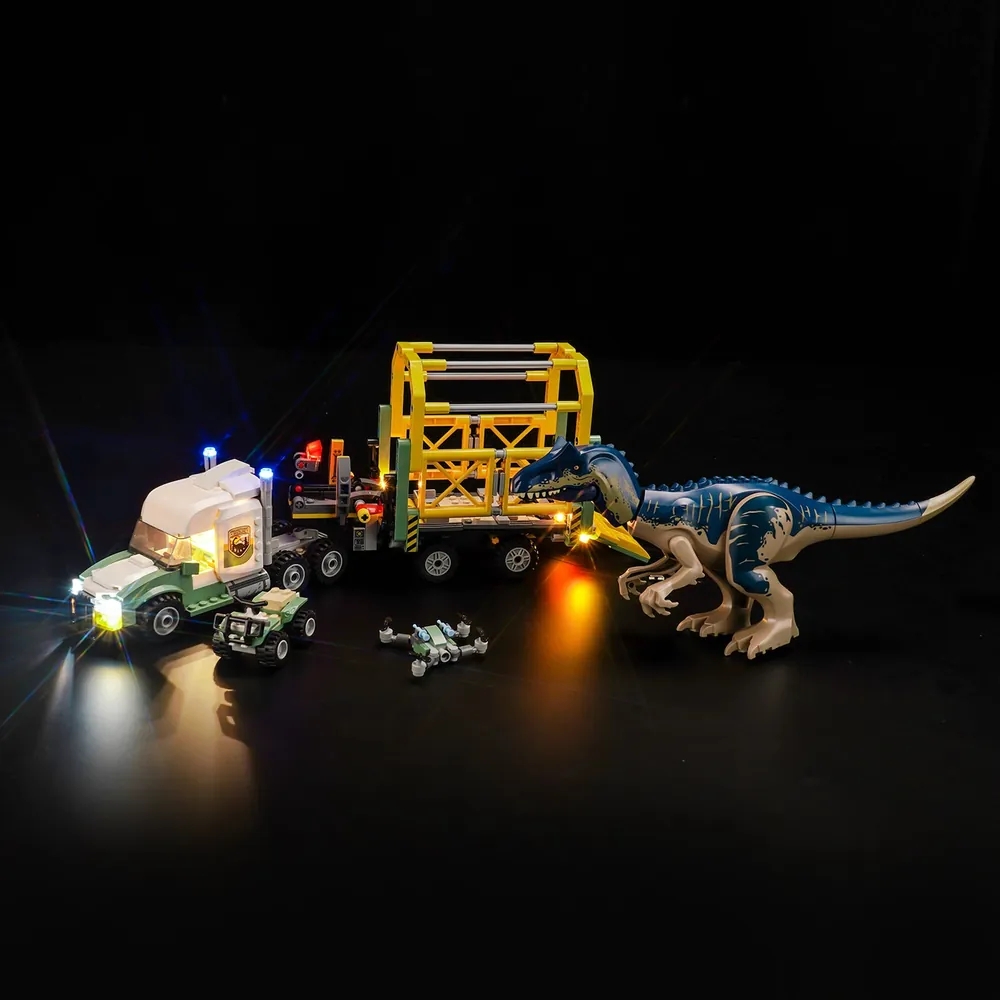 Display of the Allosaurus transport truck with illuminated ATV and drone