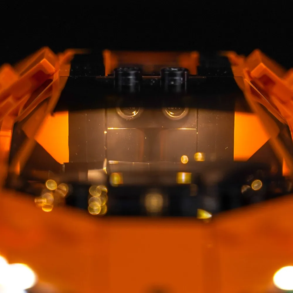 BrickBling LED kit for LEGO 77238 with underglow effect on the Revuelto, demonstrating simple lighting zones