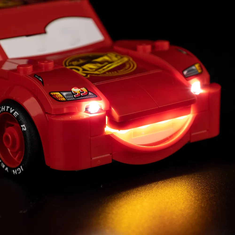 Game of Bricks LED kit for LEGO Lightning McQueen 77255 glowing in display case