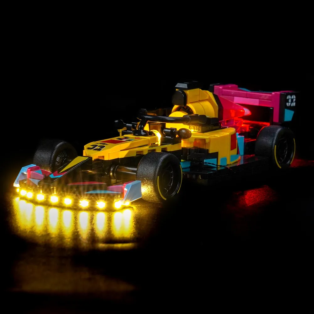 BrickBling LED kit lighting the magenta and yellow nose cone of the LEGO F1 Academy Speed Champions car