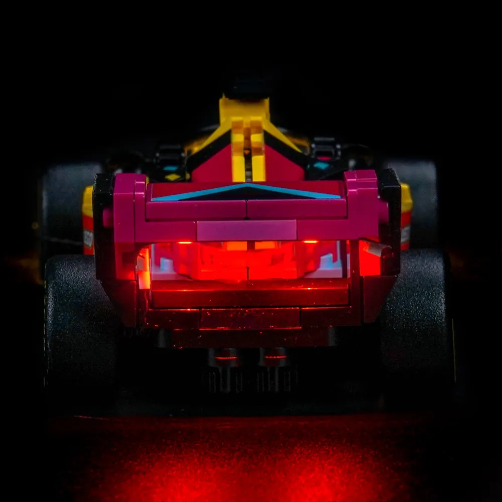 Close-up of the F1 Academy minifigure cockpit illuminated by the BrickBling kit's micro-LEDs