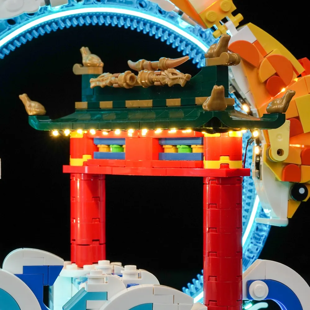 LEGO 80120 Prosperity Carp Leaping set with BrickBling LED lights creating a luminous display