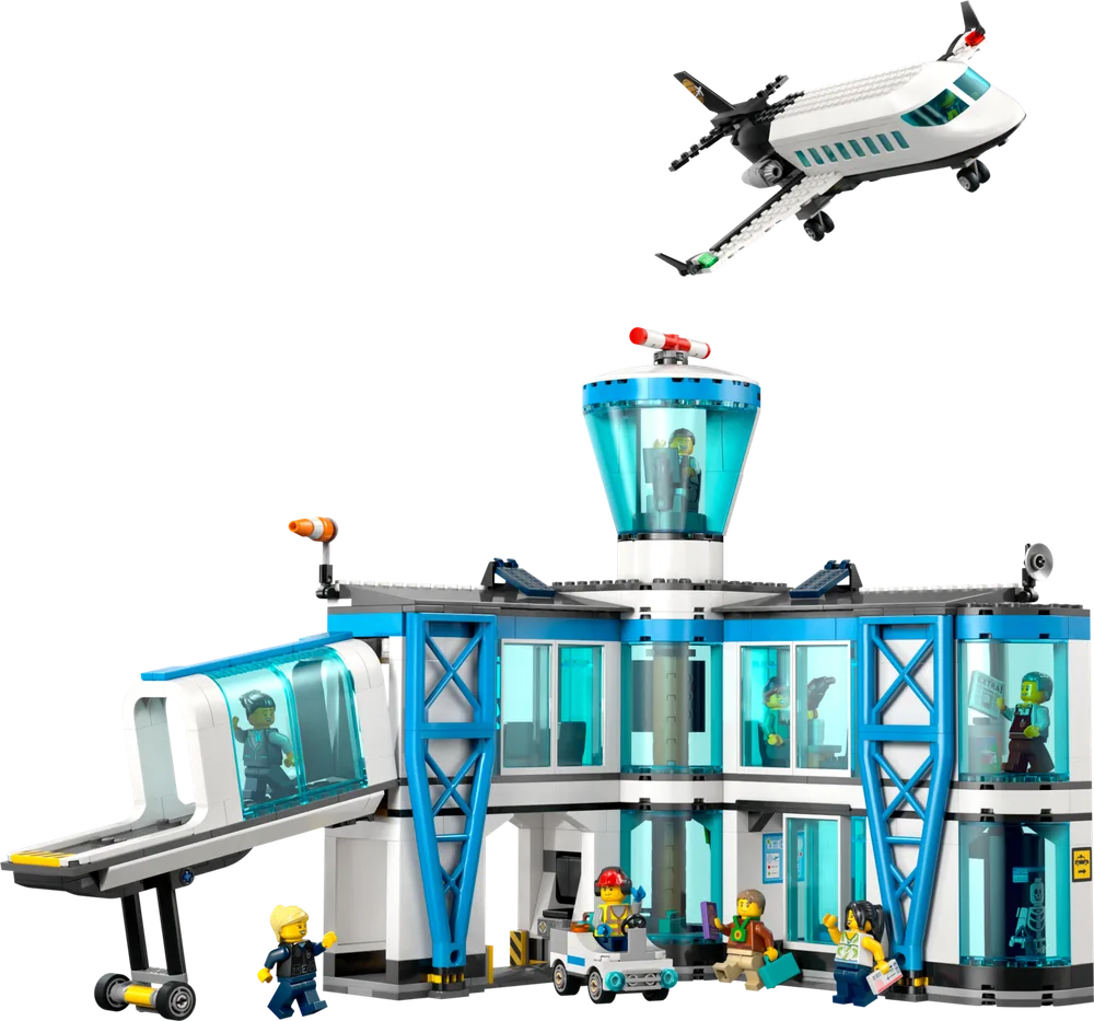 LEGO City Airport with a two-story terminal building, a control tower, an airplane flying overhead, and minifigures engaging in various airport activities.
