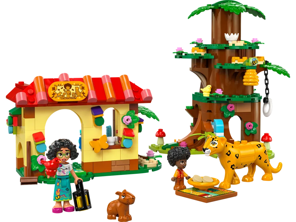 Mirabel and Antonio minifigures with a leopard and capybara in front of a small house and a multi-level tree build.