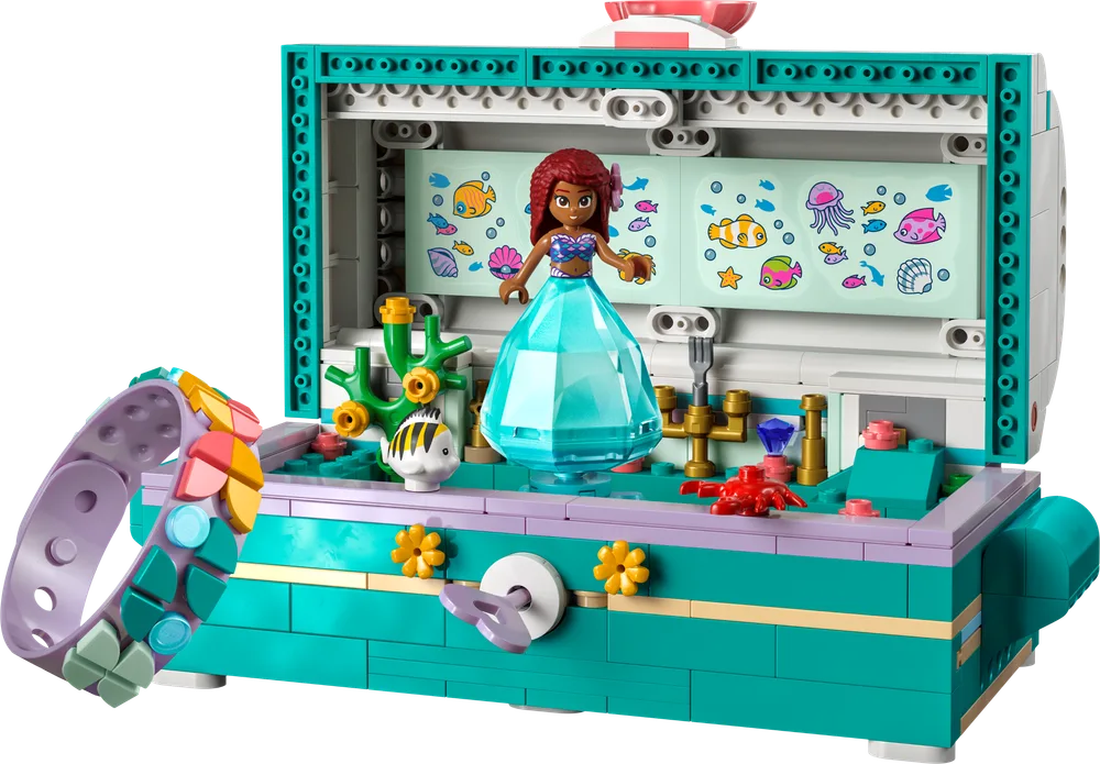 Open LEGO Disney Ariel's Treasure Chest showing the interior with Ariel mini-doll, Flounder, Sebastian's crab, and a removable bracelet.