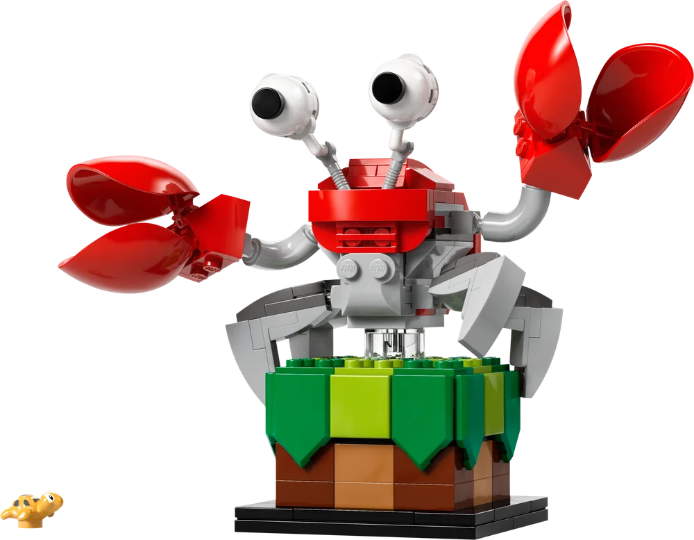 Close-up of LEGO Sonic the Hedgehog Badnik Crabmeat build on a base, with a small Flicky character next to it.