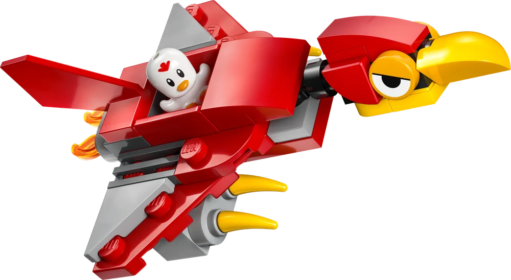 A detailed, dynamic angled shot of a small red and grey LEGO bird-like flying machine from the Sonic the Hedgehog theme, with a white Chao figure in its cockpit and yellow claw details underneath.