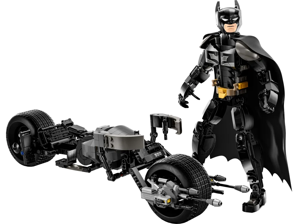 Batman construction figure standing next to the Bat-Pod motorcycle.