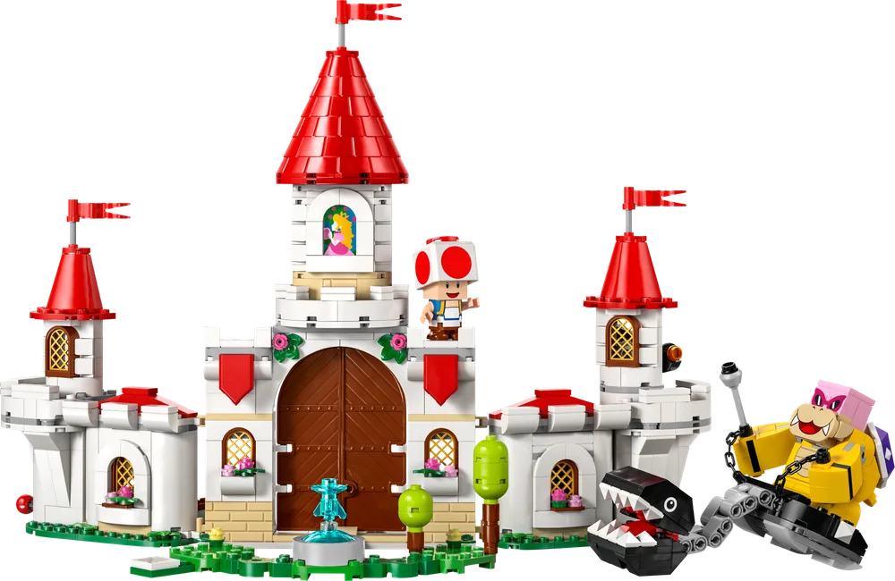 A full view of the LEGO Super Mario Peach's Castle with Roy and Chain Chomp on the right, Toad visible on a tower, and Princess Peach in a window.