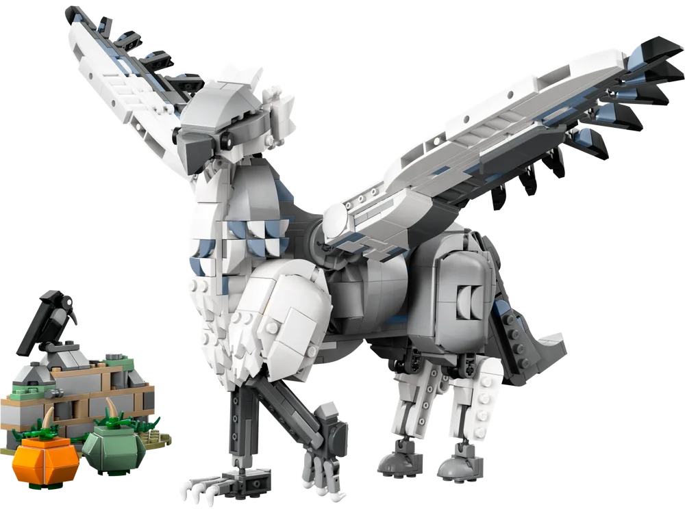 LEGO Harry Potter Buckbeak model with wings spread, standing next to a small pumpkin patch build with two pumpkins and a crow.