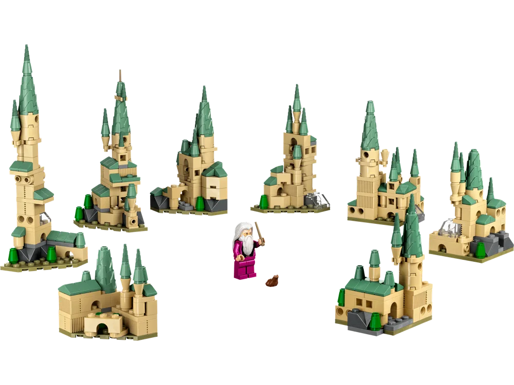 A white-bearded wizard minifigure in magenta robes stands amidst seven different small, tan and sand-green LEGO castle builds, each with pointed spires and varying architectural details. The builds demonstrate different configurations possible from a single set.