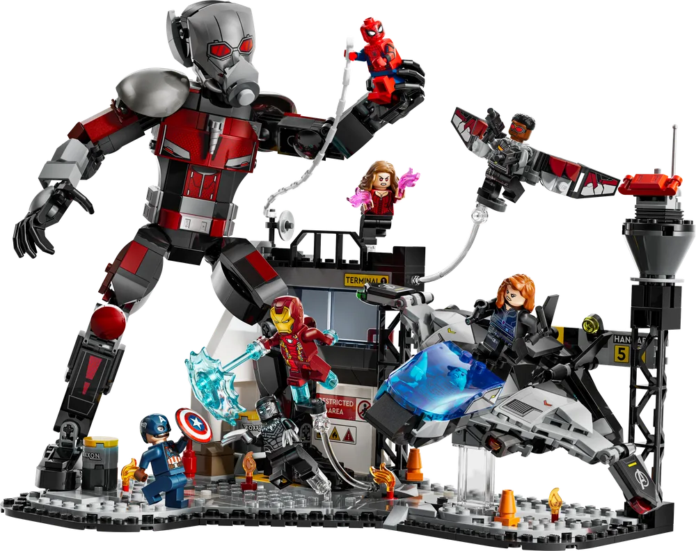 A massive Ant-Man figure looms over a detailed airport battleground with several Marvel minifigures engaged in combat.