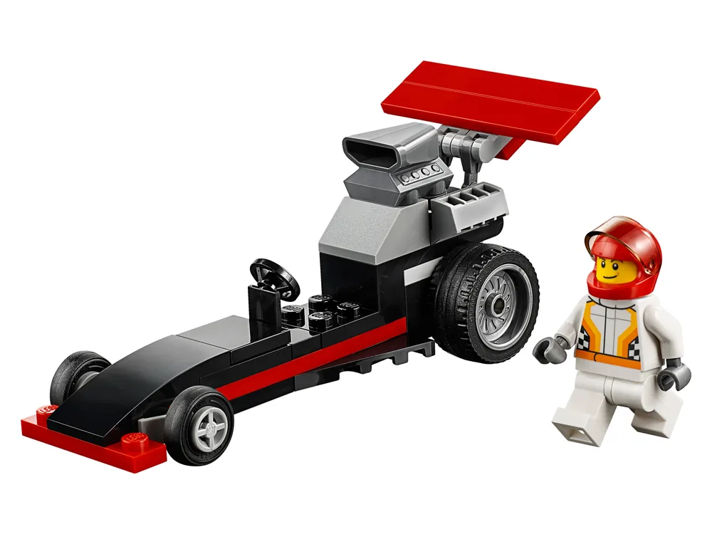 LEGO City Dragster (Set 30358) with a minifigure wearing a white racing suit and red helmet, standing next to the black and red dragster.