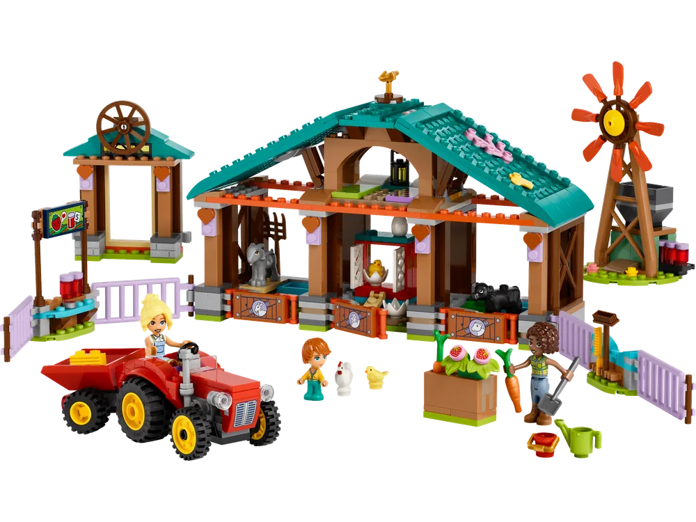 Full LEGO Friends Animal Sanctuary set 42617, showcasing the barn, windmill, tractor, minifigures, and various farm animals.