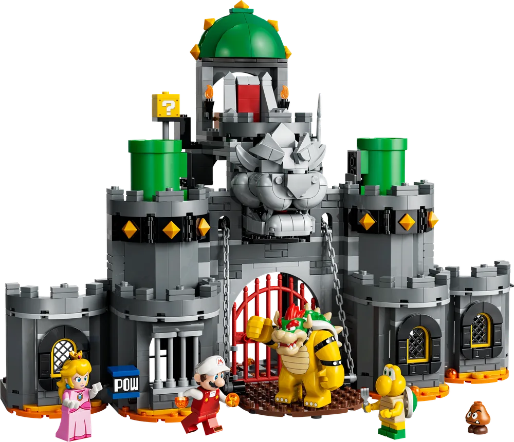 Full view of Bowser's Castle with Bowser, Mario, Princess Peach, Koopa Troopa, and Goomba minifigures. The drawbridge is down, and characters are interacting at the entrance.