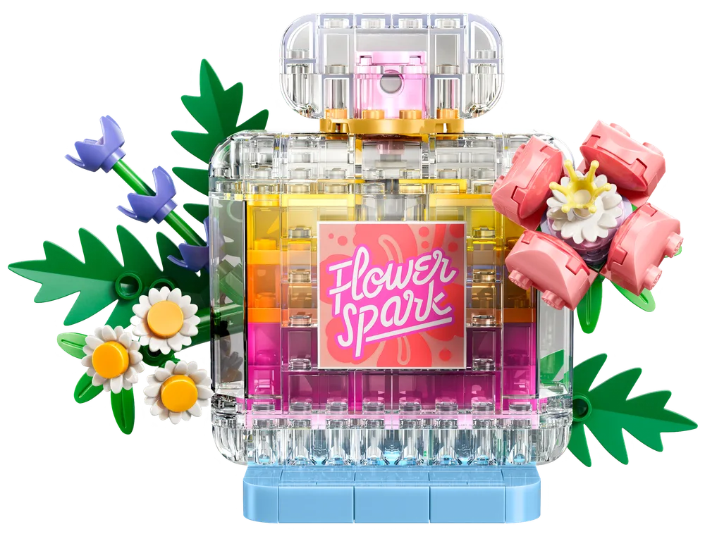 LEGO Creator 3-in-1 Flower Spark Perfume Bottle, a transparent brick-built perfume bottle with colorful layers inside and floral decorations on the outside.