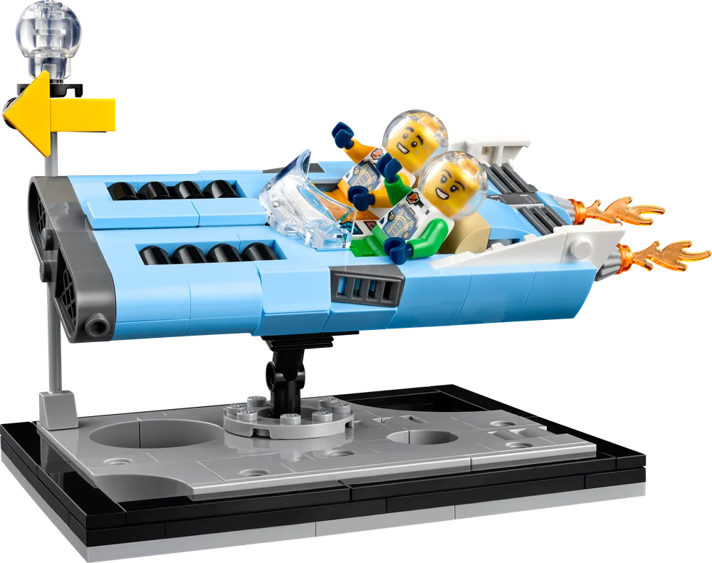 A light blue LEGO flying car with two minifigures, displayed on a black and grey stand, seen from a high angle.