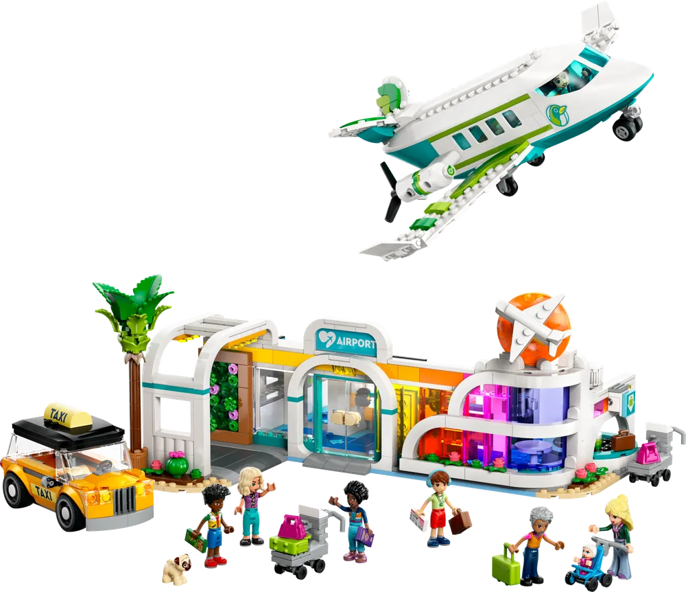 Full LEGO Friends Heartlake City Airport and Airplane set 42656, showcasing the airport terminal, a small plane, a taxi, and multiple minifigures with luggage.
