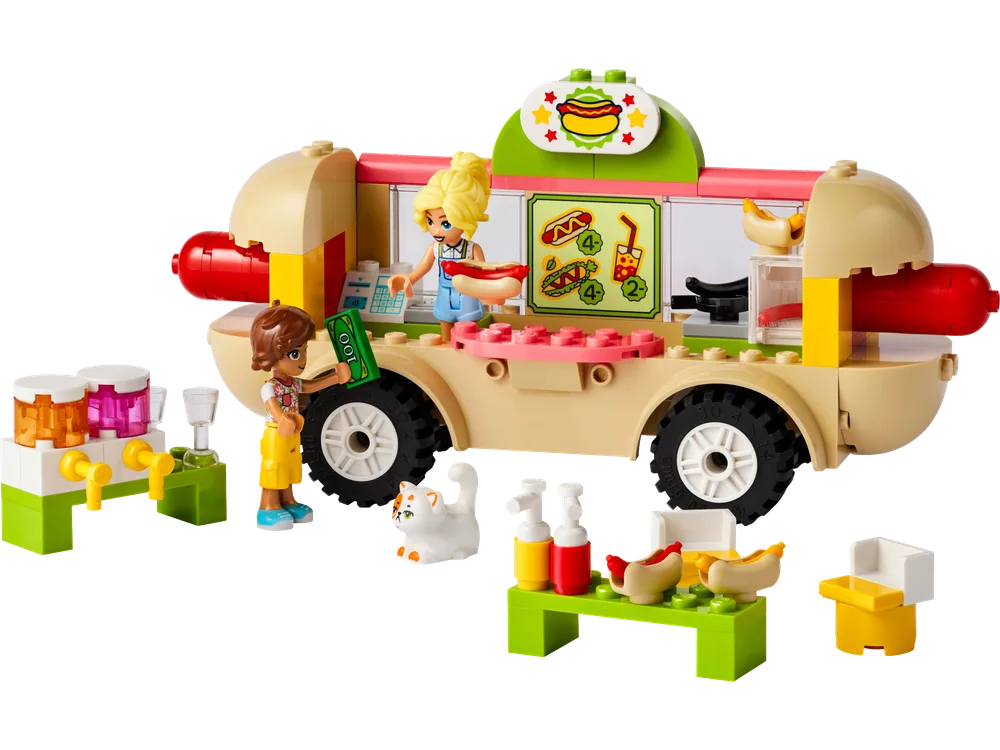 LEGO Friends Hot Dog Food Truck 42633 with two minifigures, a cat, and accessories.