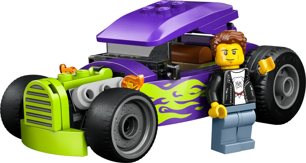 A LEGO minifigure with a black jacket and bulldog t-shirt stands next to a purple and lime green hot rod.