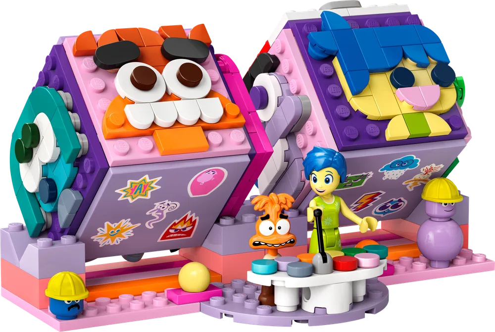 The assembled LEGO Disney Pixar Inside Out 2 Mood Cubes set, featuring two connected, colorful cubes with interchangeable emotion faces and LEGO minifigures of Joy and Fear on a control console base, with two smaller emotion workers.