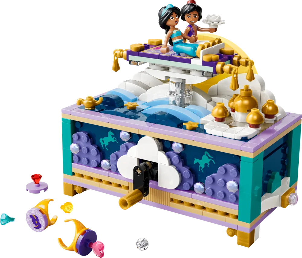 LEGO Disney Princess Jasmine's Storybook Adventures set 43295 featuring Jasmine and Aladdin on a magic carpet over a musical jewelry box with various gems and accessories scattered around.