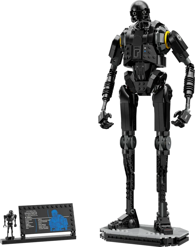 Full view of the LEGO Star Wars K-2SO build, standing on a display base next to a smaller minifigure and an informational plaque.