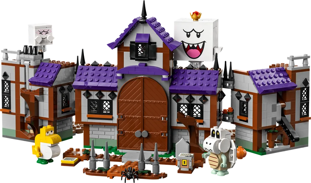 The LEGO Super Mario King Boo's Haunted Mansion (71436) set displayed from the front, featuring King Boo, Dry Bones, and Yellow Koopa Troopa outside the purple-roofed, grey brick manor.