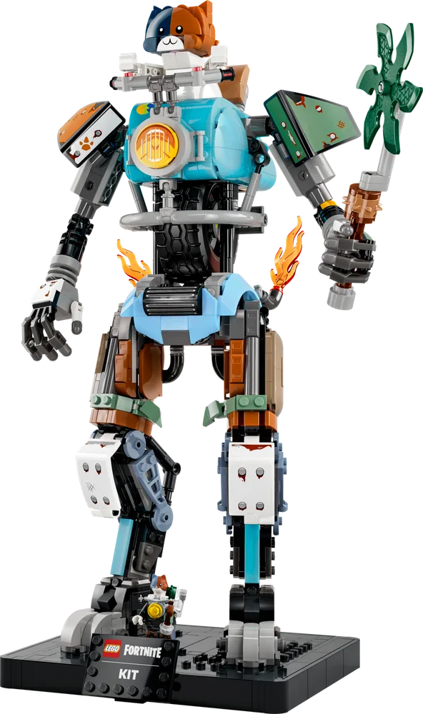 A tall, colorful LEGO mech with a cat head, named Kit, stands on a black display base. It has teal body parts, orange shoulder pads, and mechanical gray limbs with flame elements. A small minifigure stands at its feet.