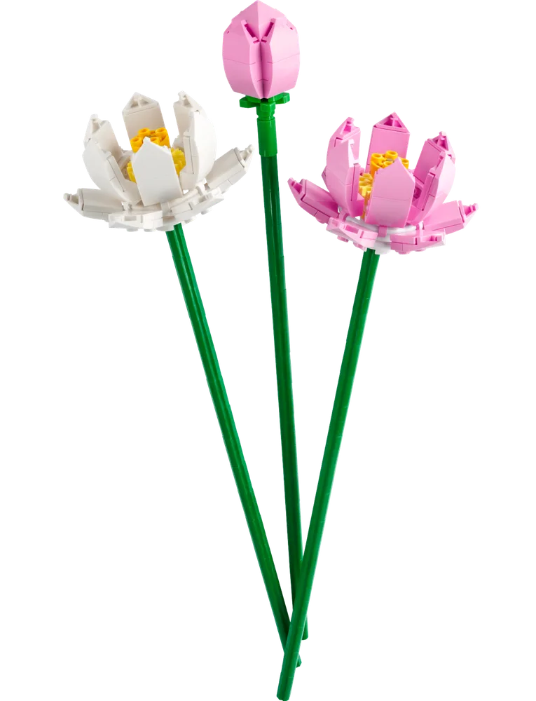 Two open LEGO lotus flowers, one pink and one white, with a pink lotus bud, all on long green stems, against a white background.