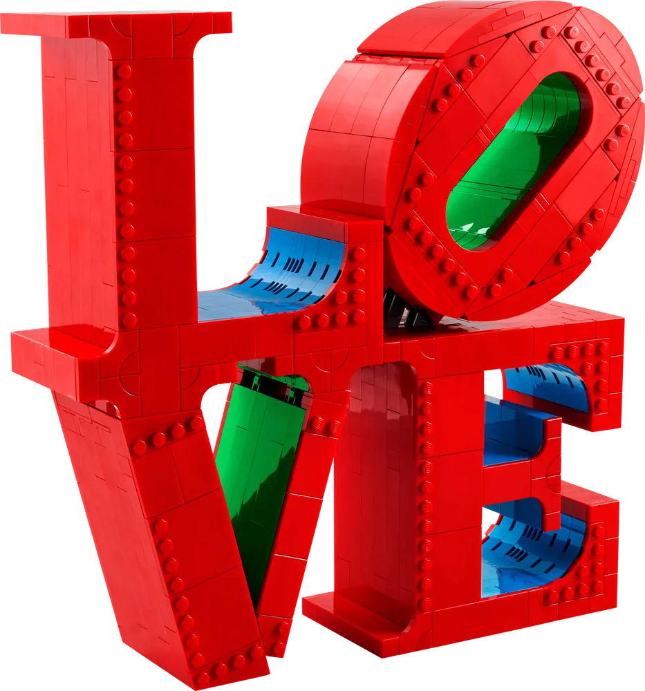 A detailed, slightly angled view of the red LEGO LOVE sculpture, highlighting the blue and green interior sections visible through the letter cutouts.