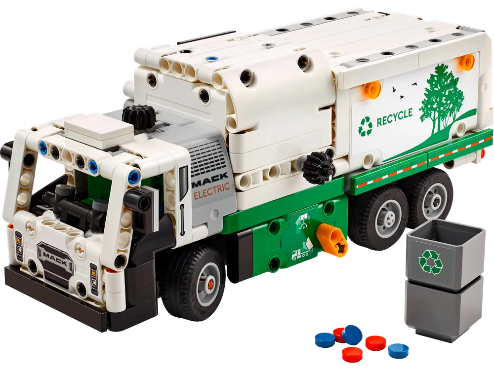 LEGO Technic Mack LR Electric Garbage Truck set 42167, a white and green model with recycling bins and colored pieces of 'trash' around it.