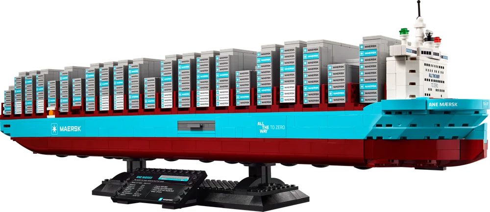 Full side view of the Maersk Dual-Fuel Container Vessel, 40955, on its display stand, showcasing its teal and dark red hull.
