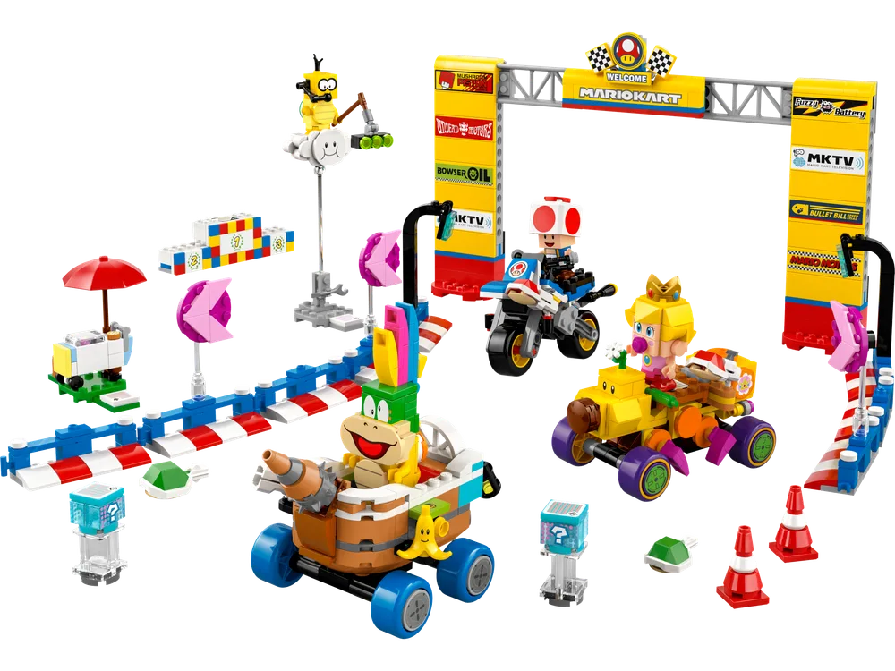 Full LEGO Mario Kart set with Baby Peach, Toad, and Larry Koopa racing around a track with item boxes and a finish line.